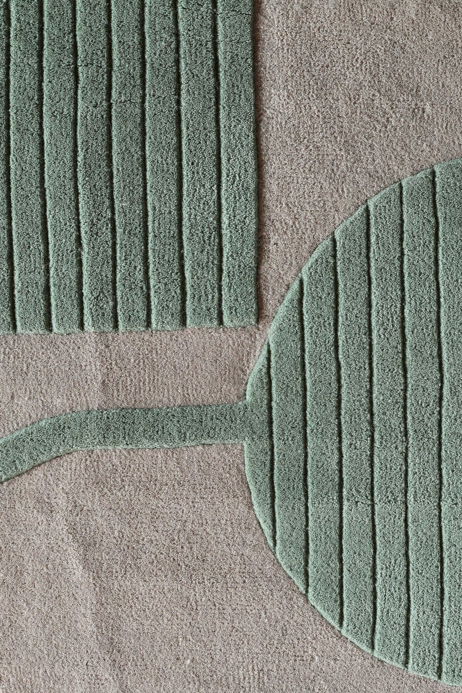 Aurora Green designer rug with textured carving and minimalist pattern