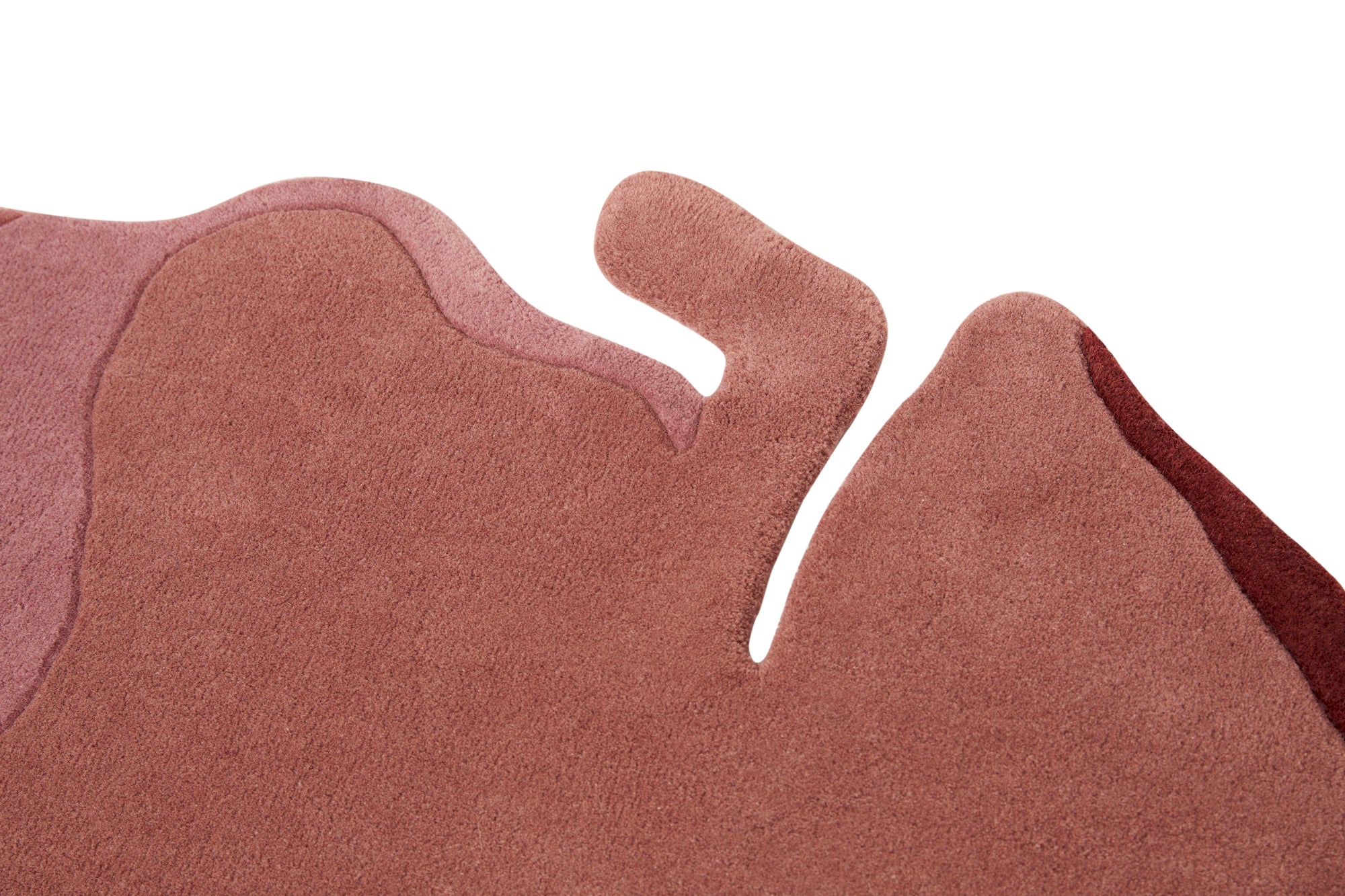 Contemporary handmade pink wool rug with organic petal design