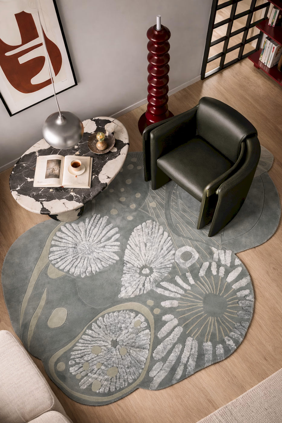 Modern green botanical rug with textured floral pattern