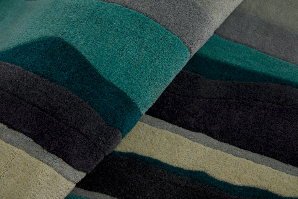 Contemporary green area rug with fractured glass design