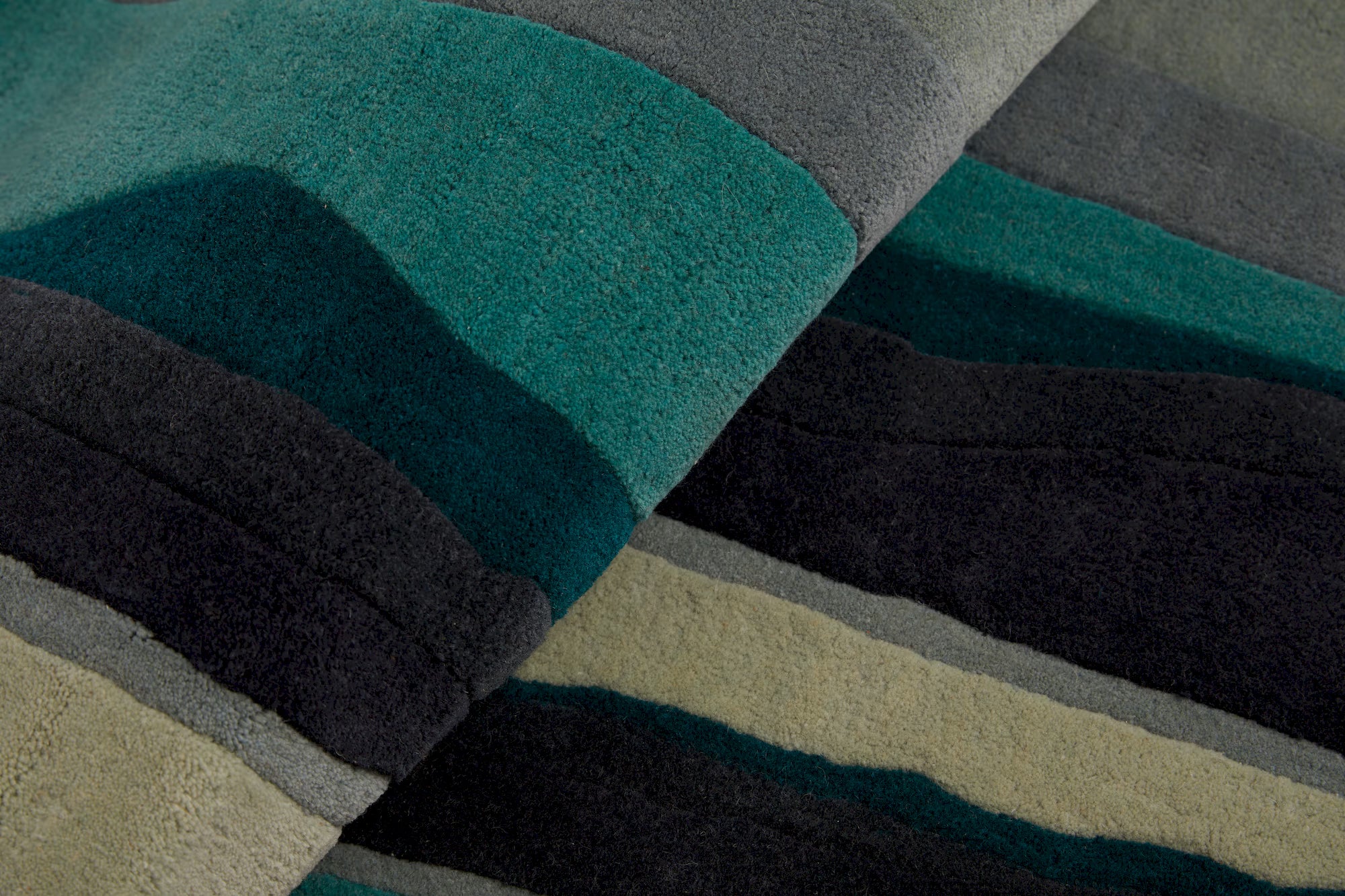 Contemporary green area rug with fractured glass design