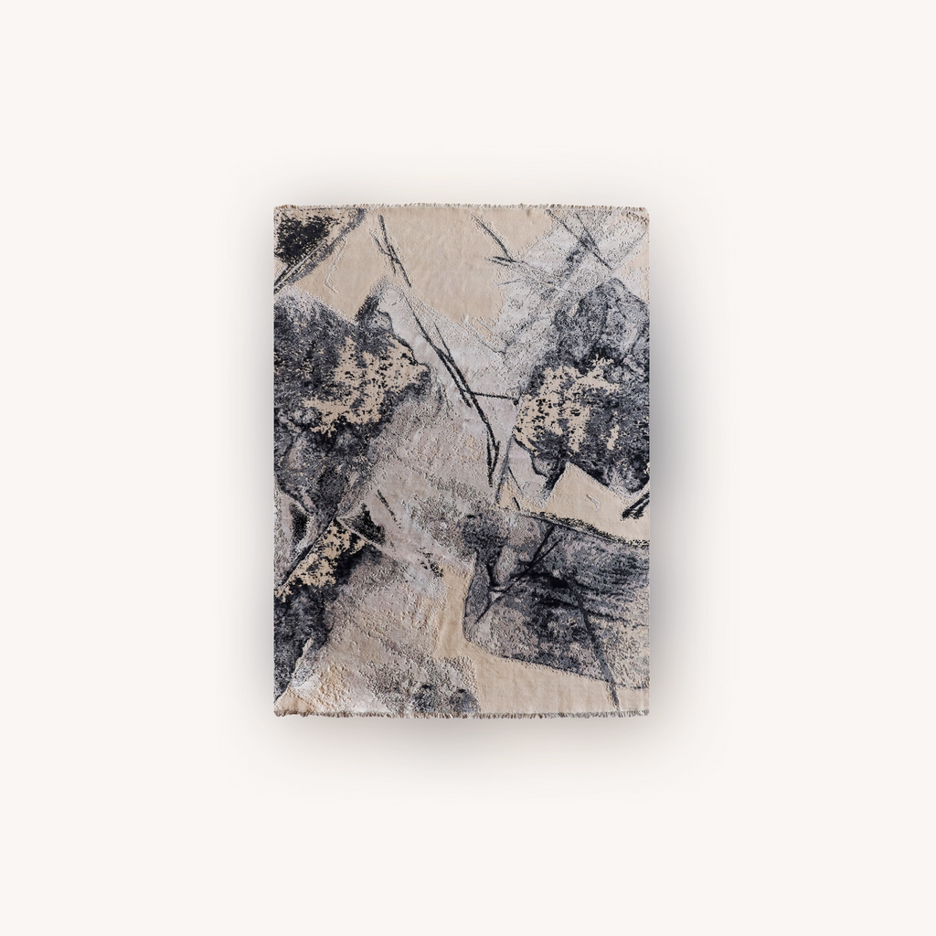 Charcoal Traces handmade wool and Tencel rug with abstract charcoal pattern