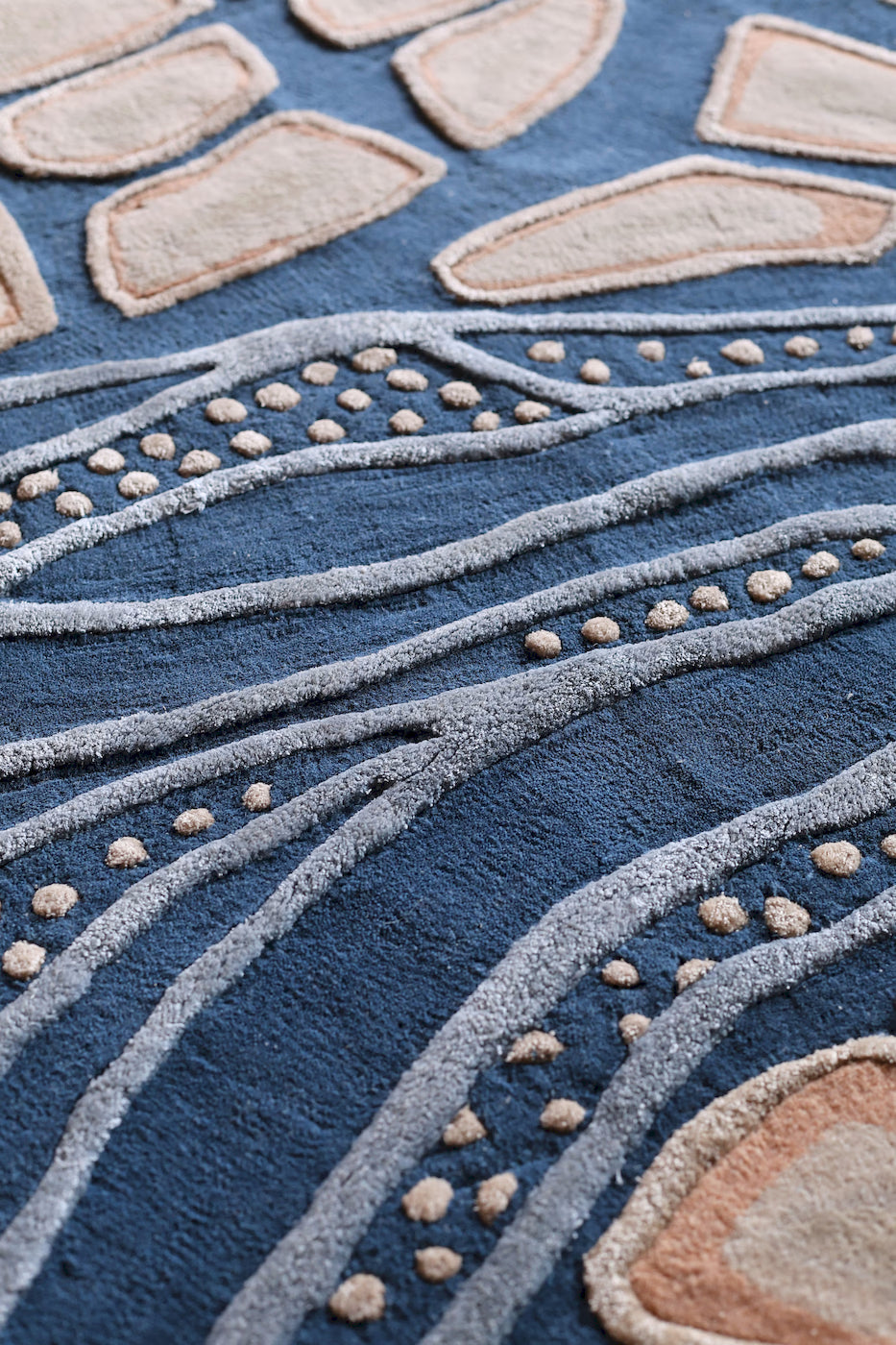 Contemporary blue area rug with textured cityscape design