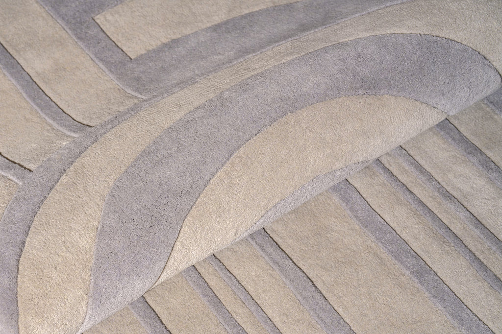 Modern minimalist grey wool rug inspired by stone texture