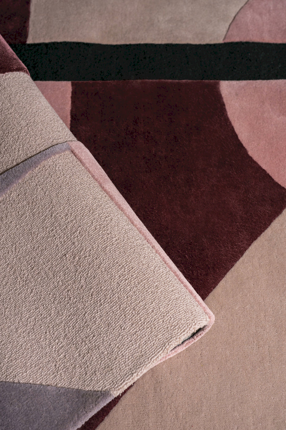 Rustic Ruse designer rug with bold geometric pattern