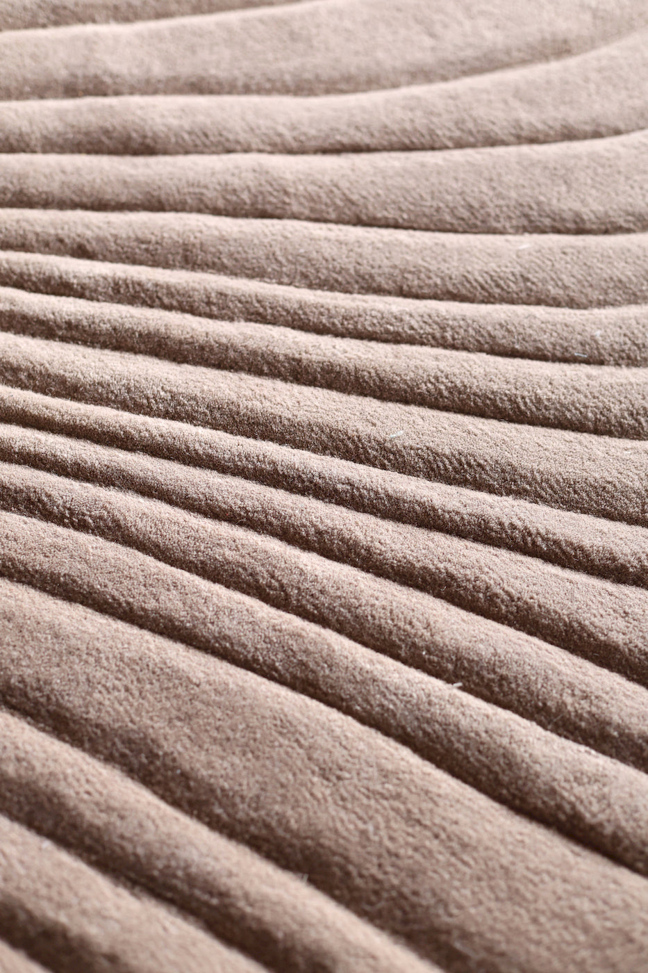 Contemporary textured wool rug in earthy beige tones