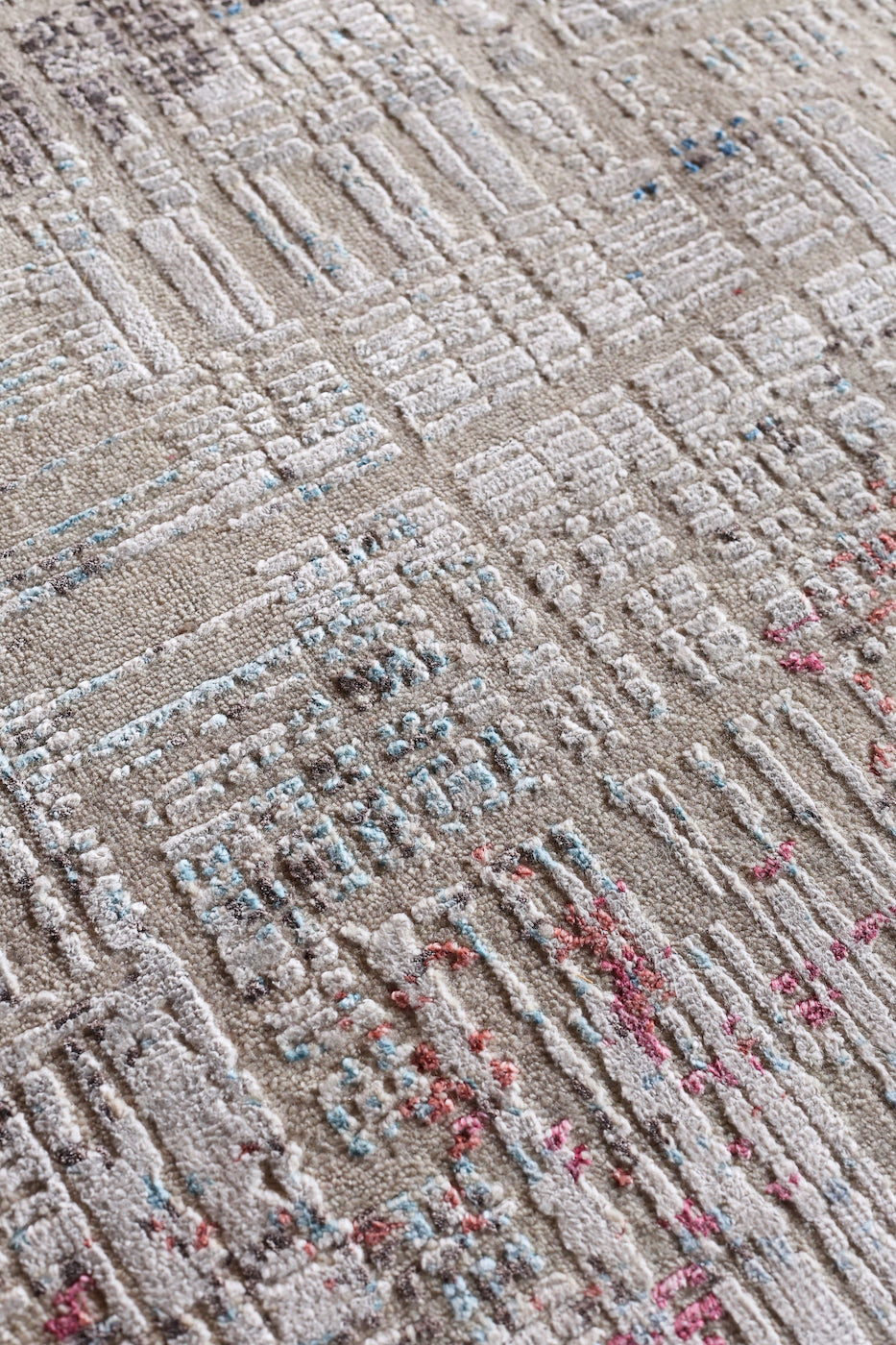 Neutral abstract wool rug with beige and blue tones