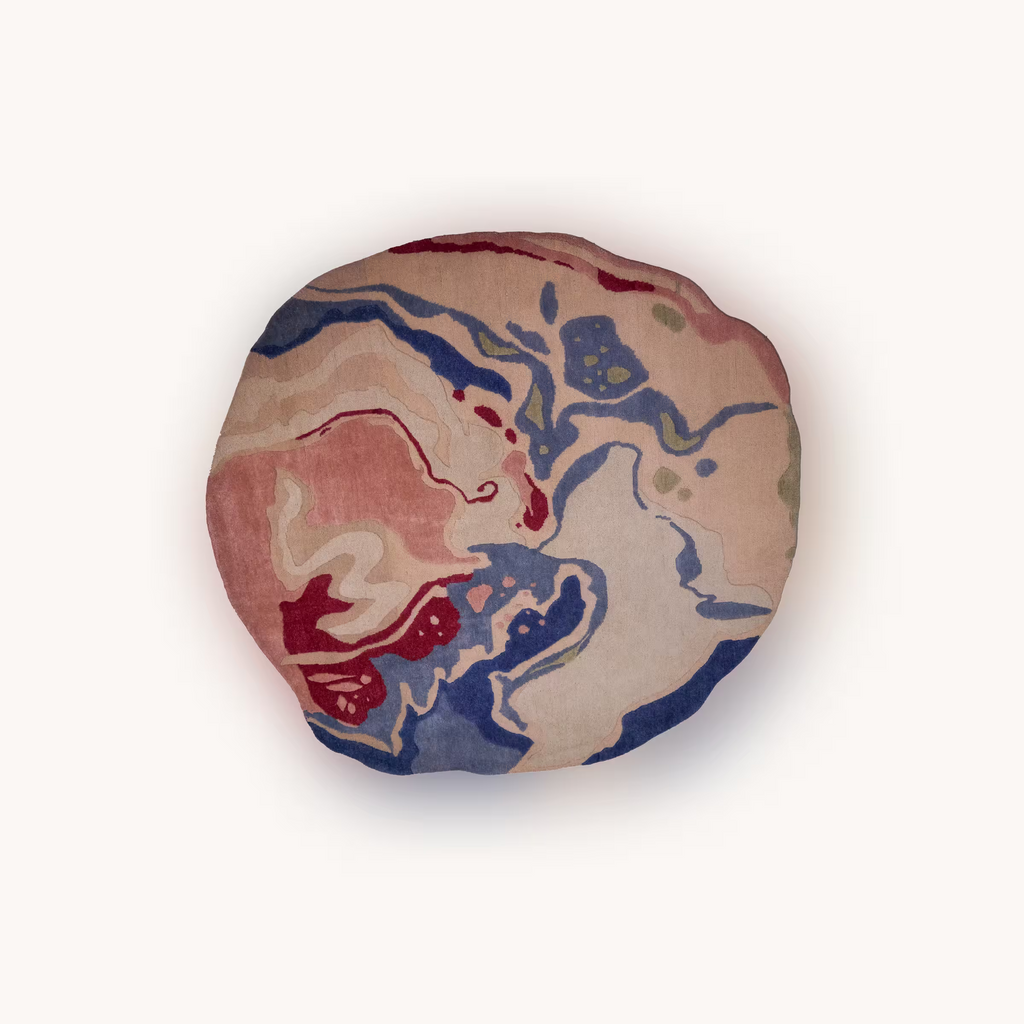 Gaia handmade round wool rug with abstract earth inspired pattern
