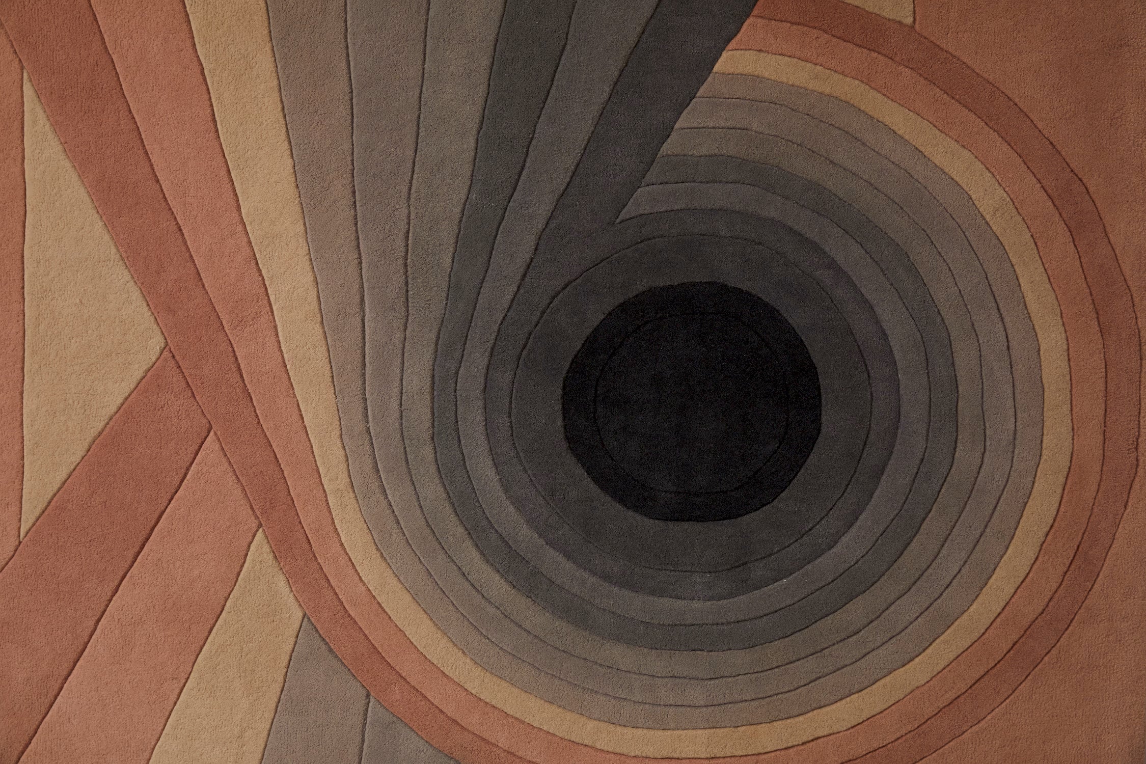 Abstract geometric wool rug with soft pastel tones