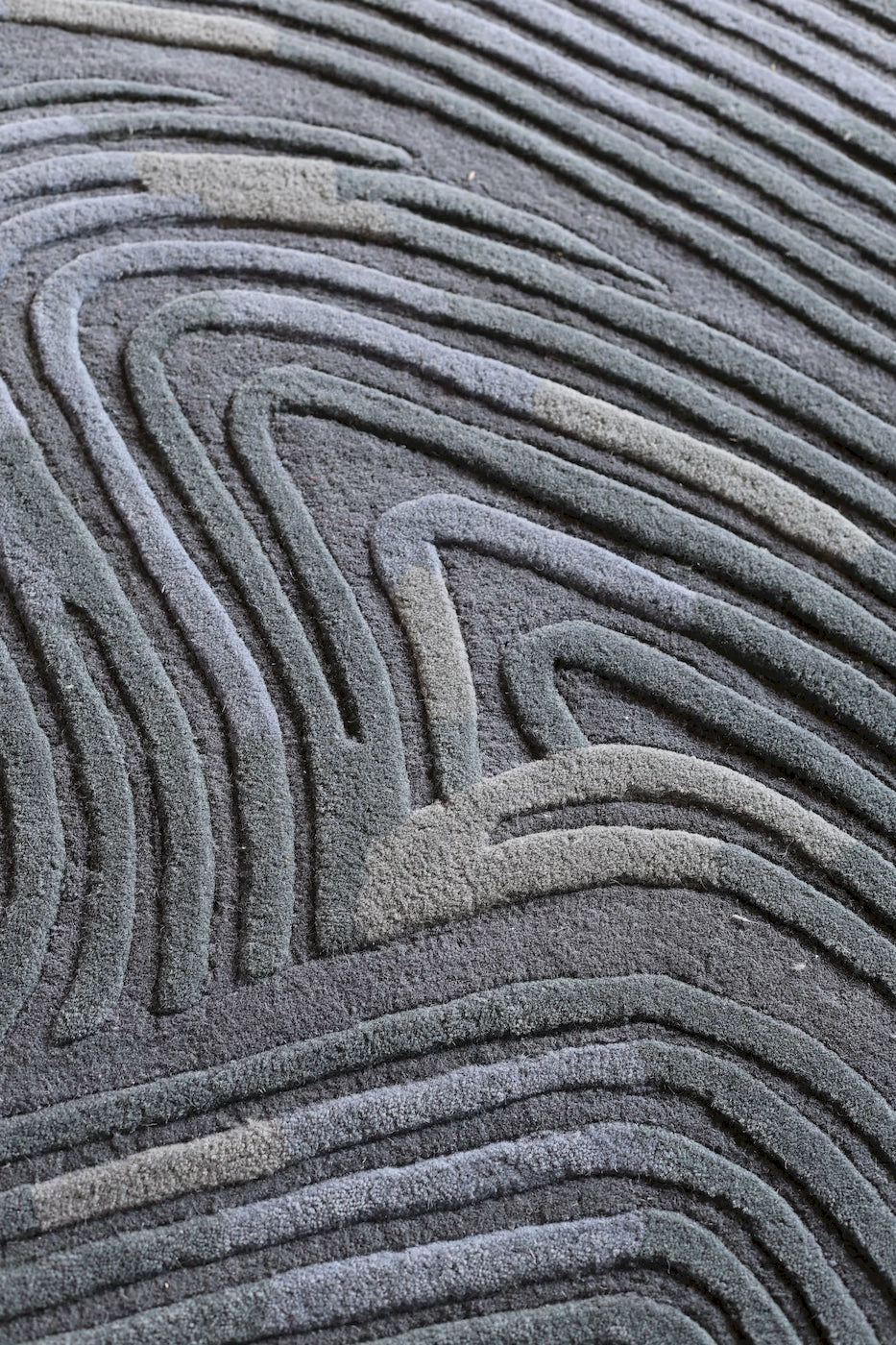 Abstract handmade New Zealand wool rug with curved lines