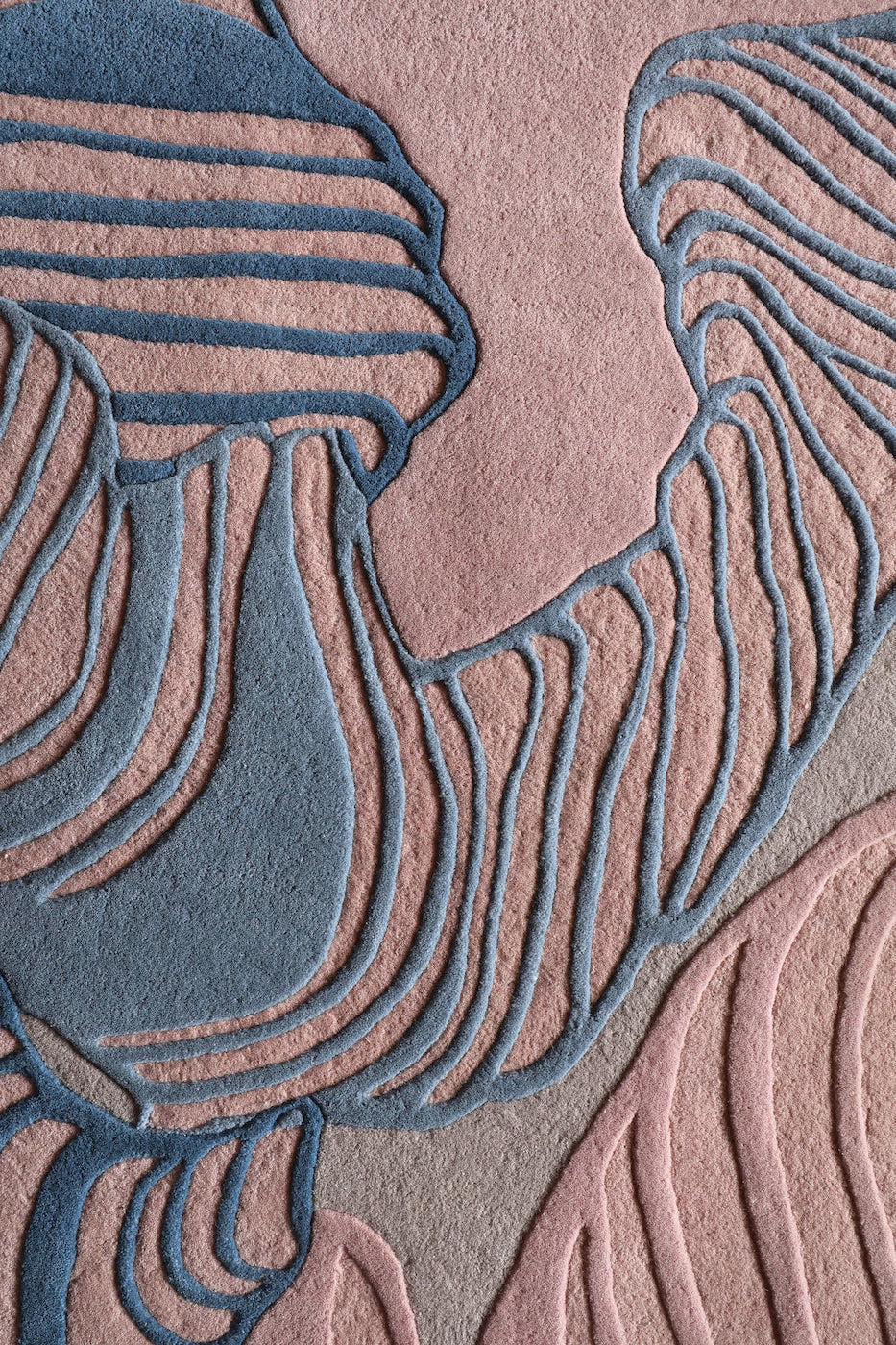 Modern pink wool rug with ripple pattern design