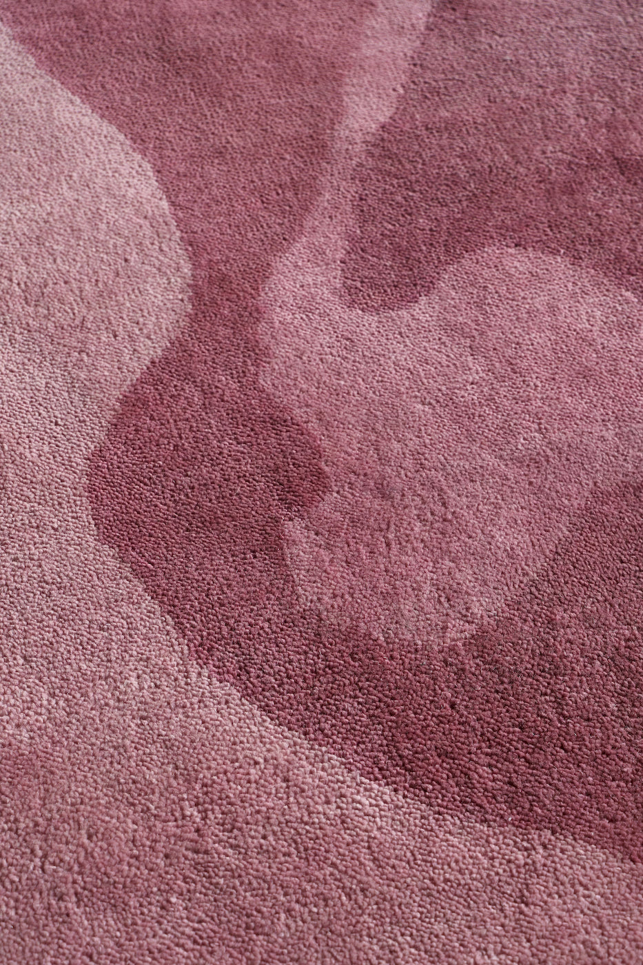 Contemporary pink abstract floral rug for bedroom decor