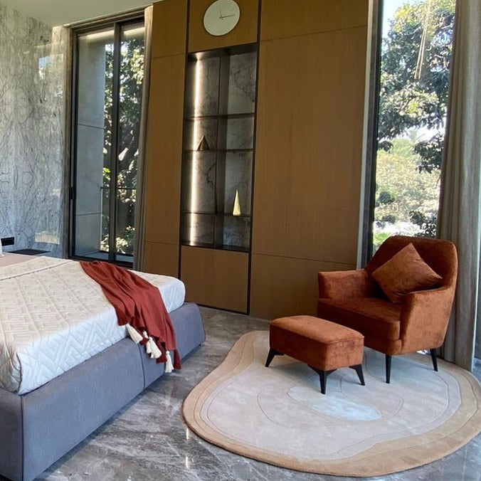 Contemporary minimalist area rug with soft beige tones