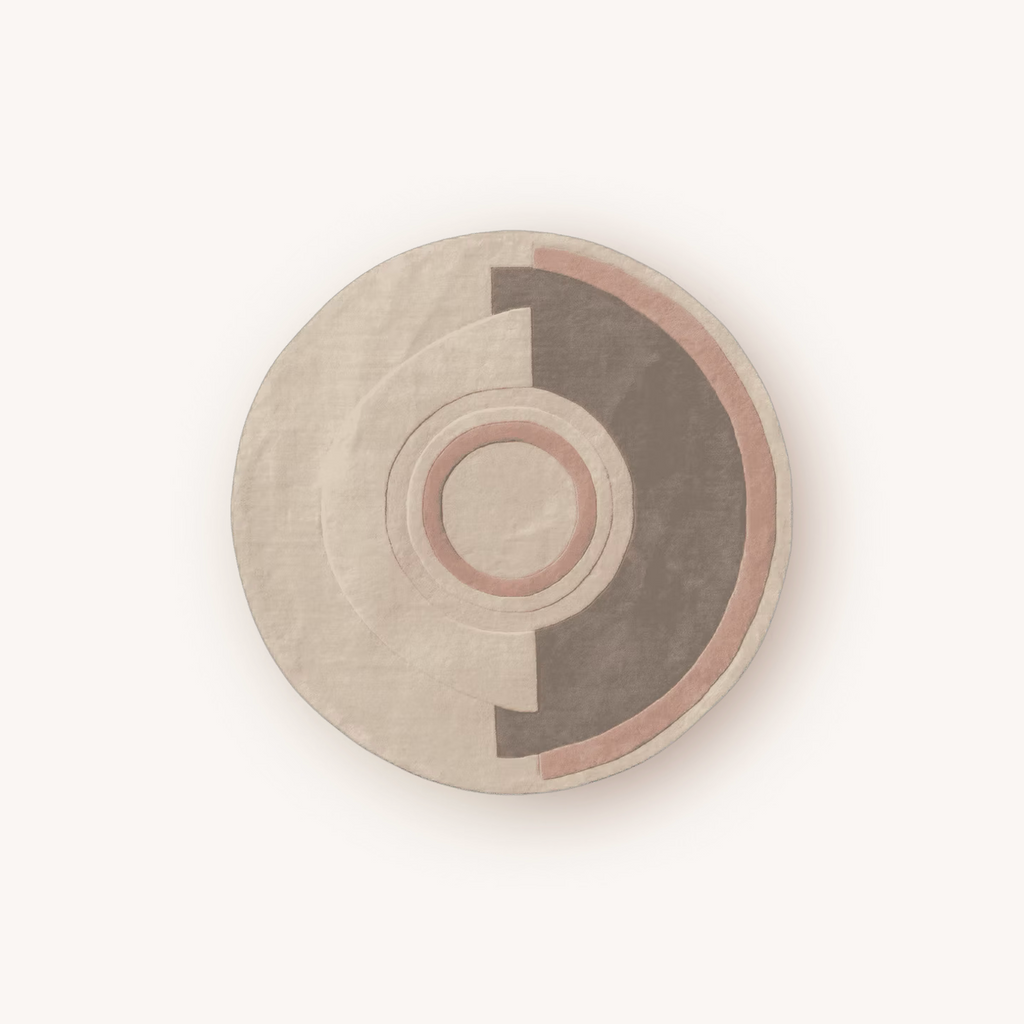 Rose handmade round wool rug with modern geometric pattern