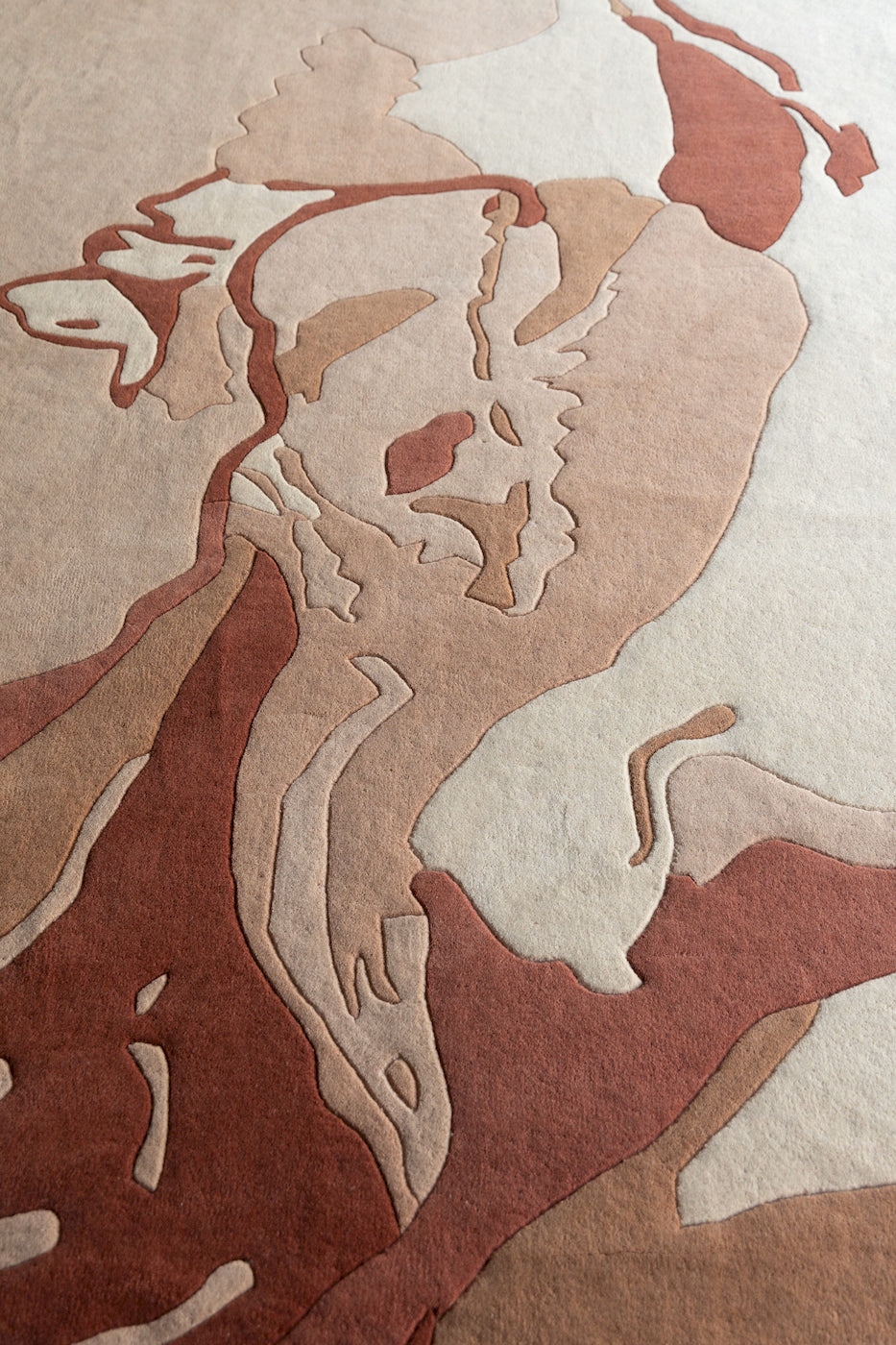 Luxury handmade designer rug with sculpted shell pattern