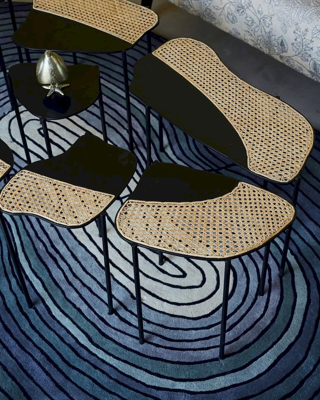 Handmade abstract wool rug with orbital pattern design
