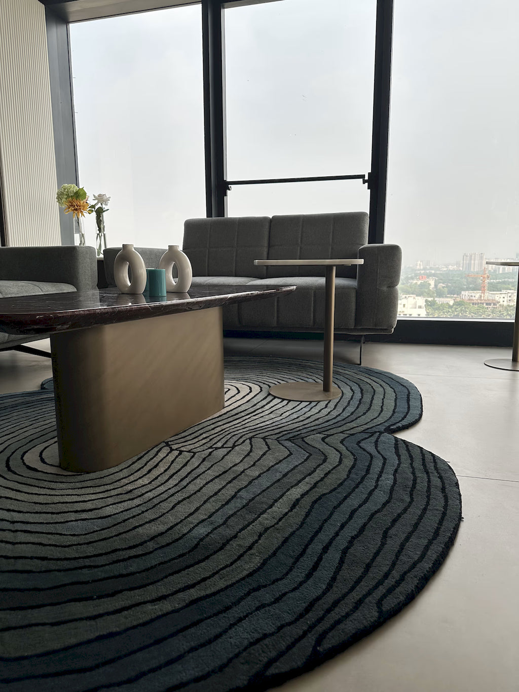 Modern abstract blue area rug made from New Zealand wool