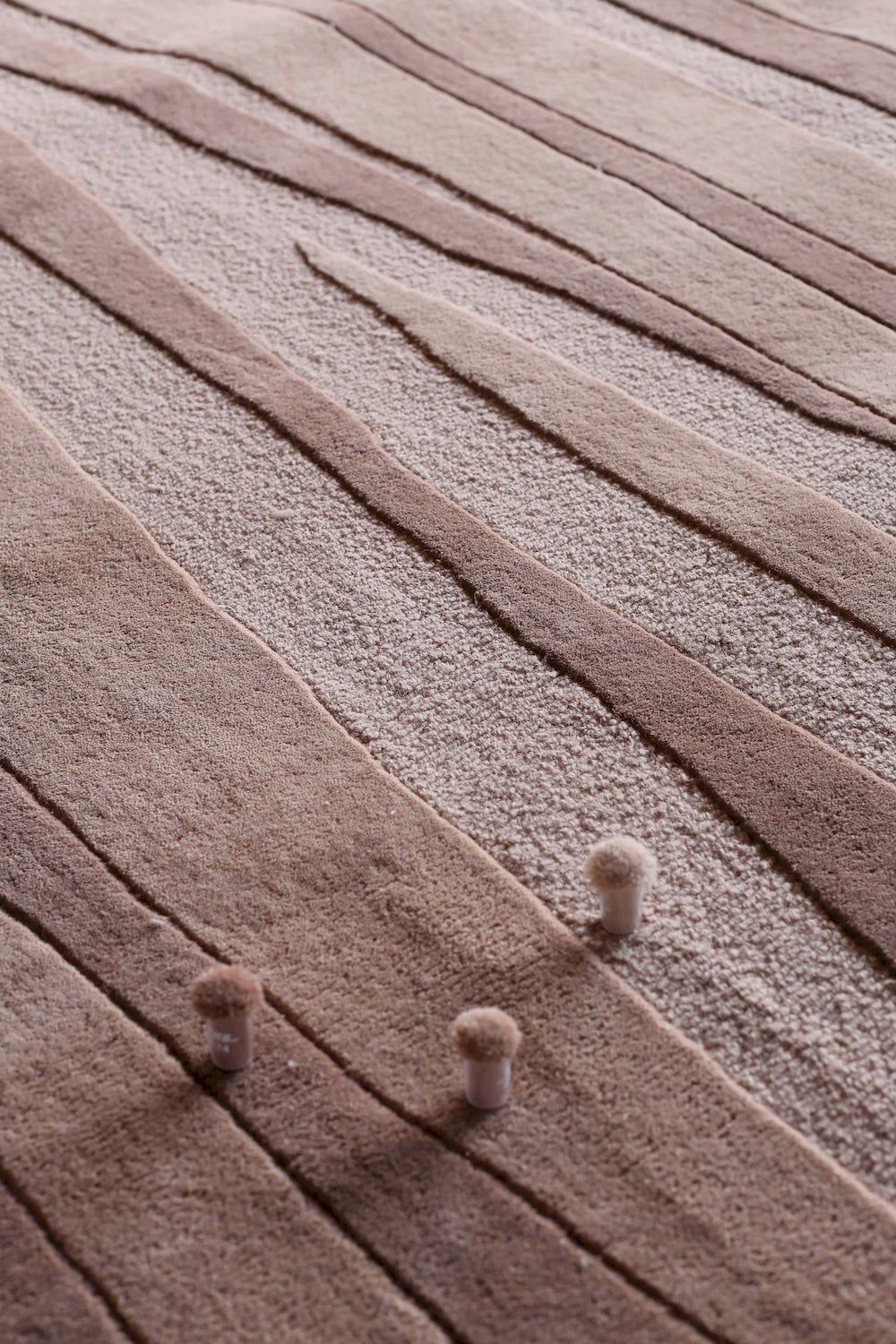 Rust abstract wool rug with linear pattern design