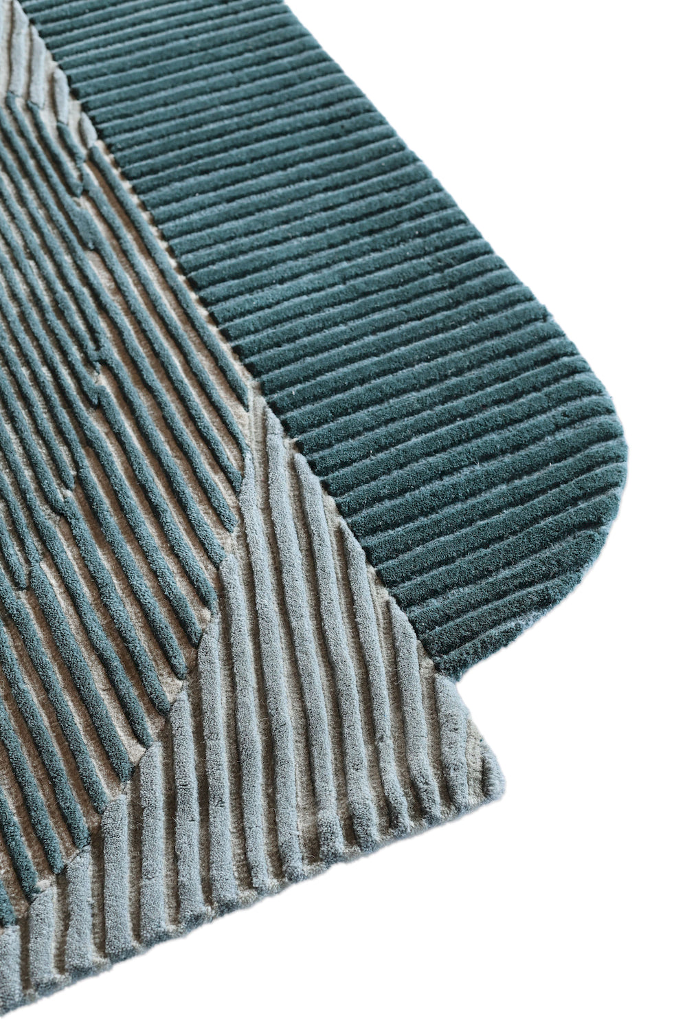 Handmade New Zealand wool rug in teal and neutral tones