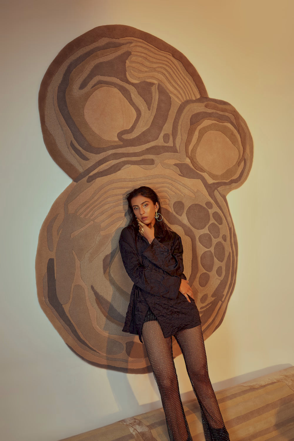 Handmade artistic wool rug with sculptural shapes