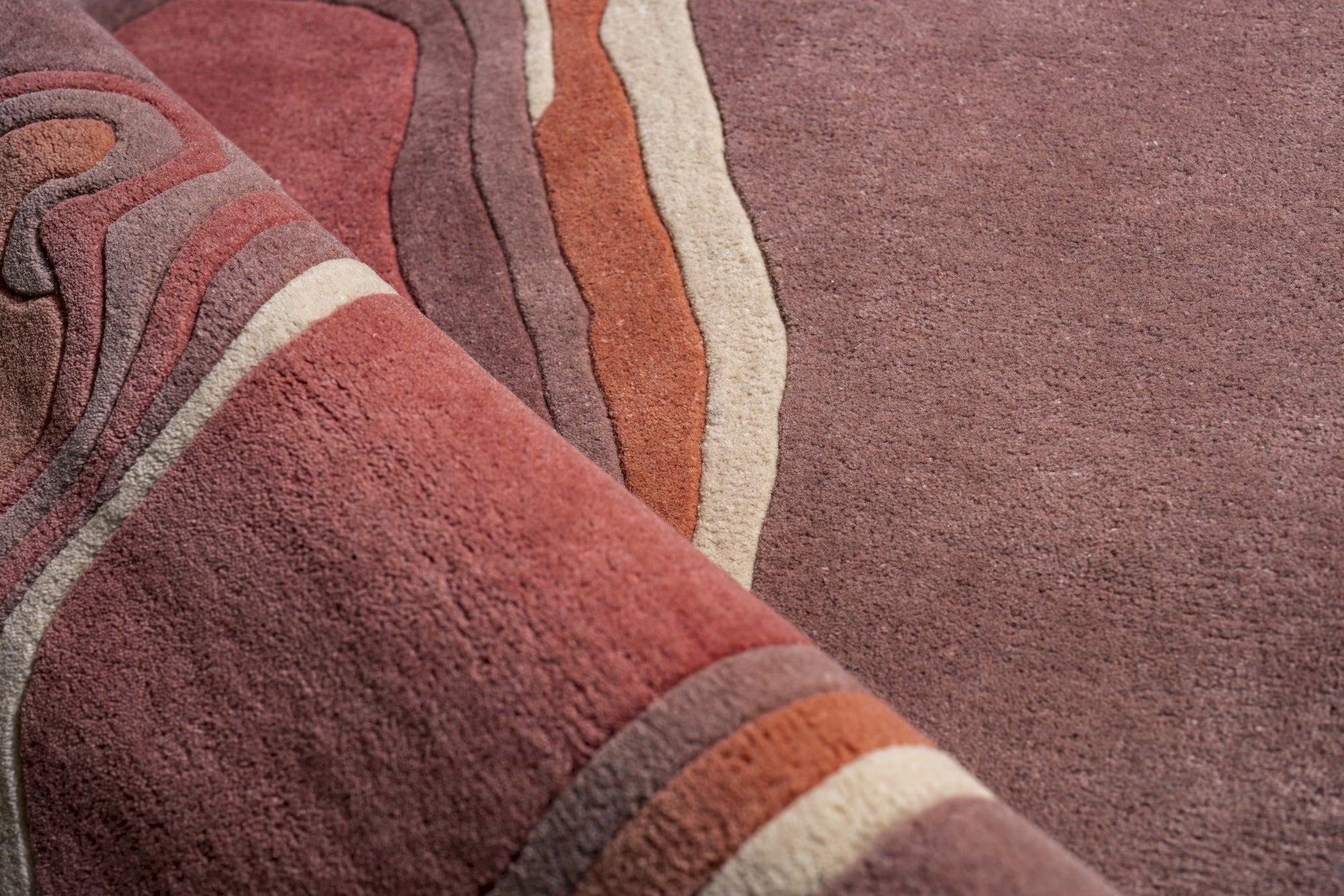 Abstract flamingo inspired pink wool rug