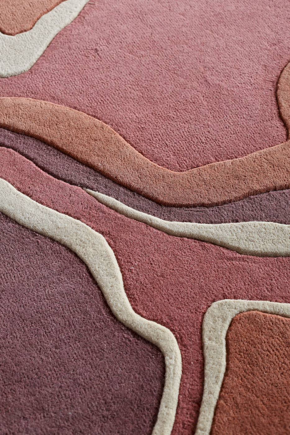 Modern pink designer rug inspired by flamingo shape